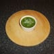 Melted butter is poured in to fill the ramekin