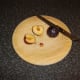 Slice plums in half, remove pits, and then slice again