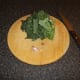 Shredded Savoy cabbage and garlic for braising