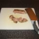 Chop the rested duck before stir-frying