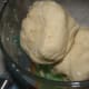 Split the dough into two balls.