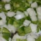Sautee chopped onion and pepper in oil & let it cool before gently mixing it into the seasoned crab meat mixture.