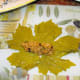 Start with one leaf, shiny side down. Add a finger-width of filling on the lower third of the leaf. You kind of want to keep the filling about 1/2 the width of the leaf, but centered.
