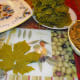 Get your work area ready so that everything is at hand. Have a plate for finished sarma, you're leaves handy and the filling close by.