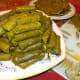 Stack your finished grape leaves and continue working until you've used up all your filling