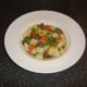 This one pot chicken liver and vegetable stew is served simply garnished with some freshly chopped parsley.