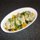 Simply grilled sardine fillets served on a tasty bed of oven roasted mixed vegetables.