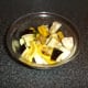 Vegetables are chopped, seasoned and stirred in olive oil