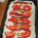 with anchovies and tomatoes