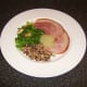 This three-times-lucky New Year dish incorporates roast ham, sauteed Savoy cabbage and black-eyed peas.