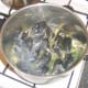 Mussels are added to the boiling liquid