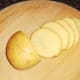 Potato is thinly sliced for frying