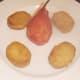 Poached pear is plated