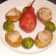 Cut partridge breast fillets are laid on fondant potatoes