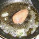 Partridge breast is pan fried in herb butter