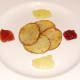Potato discs form bed for partridge breast