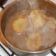 Chicken stock added to fondanting potatoes