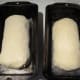 Shaped loaves in greased loaf pans.