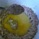 Add the eggs and one spoon of flour mixture.