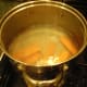 Carrots cut in strips, boiling.