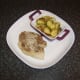 Pork chop and stir fry are plated
