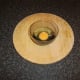Egg is broken in to a small bowl or cup and then poured in to frying pan