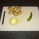 Cooked potatoes, onion and chilli for stir fry