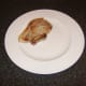 Cooked pork chop is ready for accompaniments