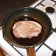 Pan frying the pork chop