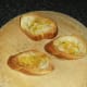 Olive oil and seasonings are added to toast