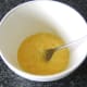 Beating duck eggs for omelette