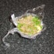 Duck egg fried rice is shaped for plating