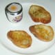 Coddled duck egg and bruschetta are plated