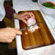 While tomatoes are steaming, chop & saute onion