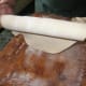 When Most of the Pastry is Safely Wrapped Around Your Rolling Pin, Transfer to Your Pudding Tin.