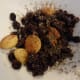 Toast the nuts, seeds, raisins, garlic, etc.