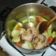 Lamb bones are browned before water is added