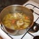 After two hours, the liquid in the lamb stock has been reduced by half