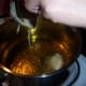 9. Drop spoonfuls of the batter into the hot oil.