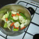 Vegetables are sautéed in the oil for 3 or 4 minutes.