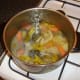 Vegetable stock has been simmered for half an hour and is ready to be strained.