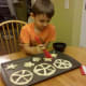 Brush on melted butter to tops of biscuits.