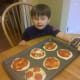 Add pepperoni and pineapple (or any other toppings) to pizza.