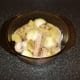 Chopped onion and pineapple are added to the chicken and seasoned