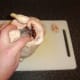 The parson's nose is cut off the chicken and the cavity is seasoned