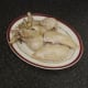 Poached chicken is cut in to portions