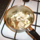 Mushrooms and chicken are sauteed in olive oil