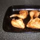 Roast tandoori chicken is allowed to rest