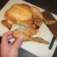 Leg and thigh portions are firstly cut from the chicken