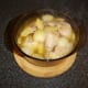Chicken and pineapple casserole is removed from the oven